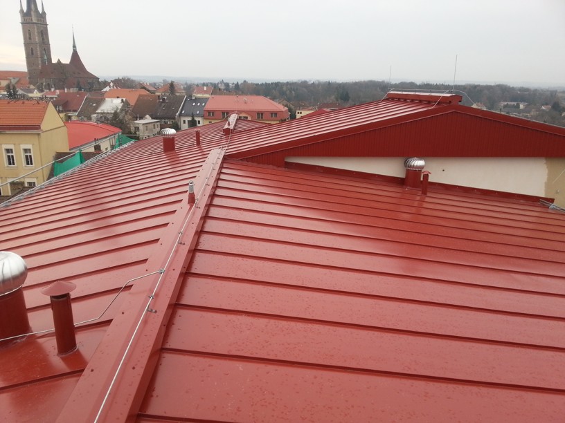 Rekonstrukce rovné střechy na šikmou